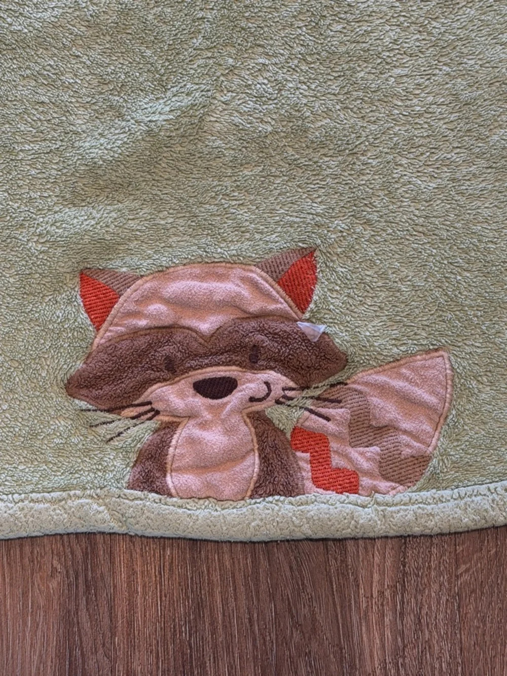 Carter's Olive Green Plush Baby Blanket with raccoon